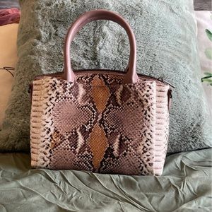 A new day (brand). Small grayish/purple snake skin handbag. Used once